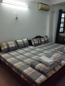 Postel nebo postele na pokoji v ubytování Sứ Lạng Hotel