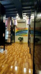 a room with a potted plant in the middle of a building at TAGBALAYON Lodging House in Siquijor