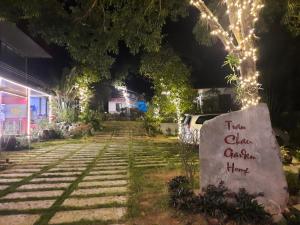 a sign that says that chicaica casica home at Tran Chau Garden Home in Cat Ba