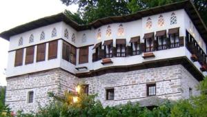 a large stone building with a lot of windows at Archontiko Blana in Vizitsa