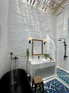 Et badeværelse på Rosarii Pacis Villa - Venuestay