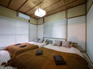 Giường trong phòng chung tại 10 mins Ogaki Sta & Ogaki Castle! Up to 10 ppl
