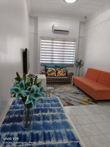 Posezení v ubytování Santorini by Loteloft at Bukit Merah Laketown