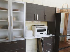 Kuchyň nebo kuchyňský kout v ubytování 1日1組の宿　OTTABIO（オタービオ）