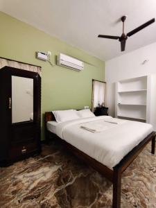 Llit o llits en una habitació de Maison Nataraja