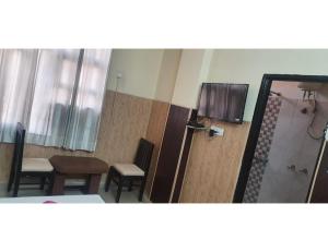 Ванная комната в Hotel Golden Village Sidcul, Haridwar