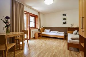 Letto o letti in una camera di FAST Ossiach