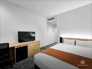 TV a/nebo společenská místnost v ubytování Daiwa Roynet Hotel Omiya-nishiguchi