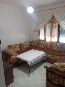 Postel nebo postele na pokoji v ubytování Appartement plage Mdiq 1