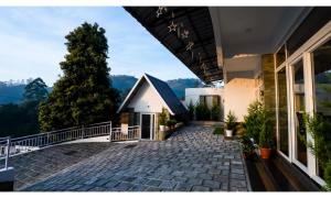 a view from the balcony of a house at Carmel Top Munnar in Munnar