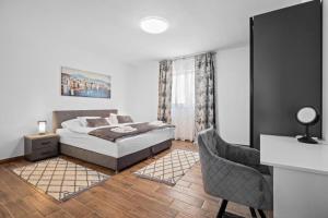 Postel nebo postele na pokoji v ubytování Villa Camelie + 79 fotografií