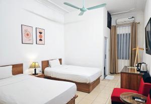 Voodi või voodid majutusasutuse Especen Hotel toas