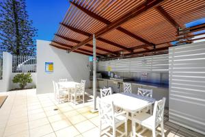 Balkón nebo terasa v ubytování Dwell @ 25, Oceanfront Apartment