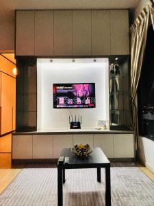 TV a/nebo společenská místnost v ubytování USJONE @poolview