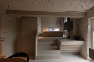 Postel nebo postele na pokoji v ubytování Luxe in Het Posthuis - nieuwe Stijlvolle Verblijven in Oud-Rekem