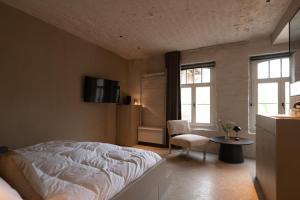 Postel nebo postele na pokoji v ubytování Luxe in Het Posthuis - nieuwe Stijlvolle Verblijven in Oud-Rekem