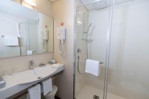 Baðherbergi á Hotel Muralto Locarno