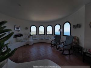 Posezení v ubytování Meervilla Mallorca - Charmantes Ferienhaus mit phantastischem Meerblick in Canyamel