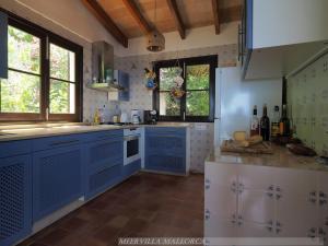 Kuchyň nebo kuchyňský kout v ubytování Meervilla Mallorca - Charmantes Ferienhaus mit phantastischem Meerblick in Canyamel