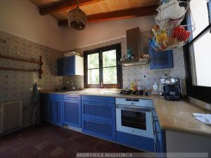 Kuchyň nebo kuchyňský kout v ubytování Meervilla Mallorca - Charmantes Ferienhaus mit phantastischem Meerblick in Canyamel