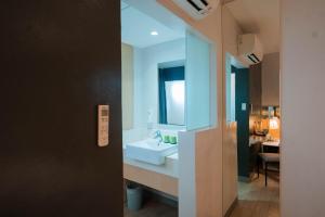 Postel nebo postele na pokoji v ubytování Go Hotels Iligan