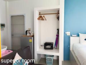 Postel nebo postele na pokoji v ubytování Phannarai House