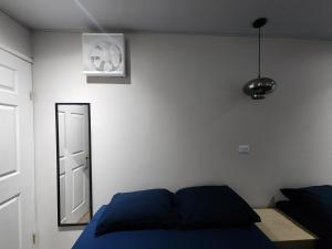 Un pat sau paturi într-o cameră la Casavana