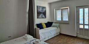 Postel nebo postele na pokoji v ubytování Nortra apartment + 16 fotografií