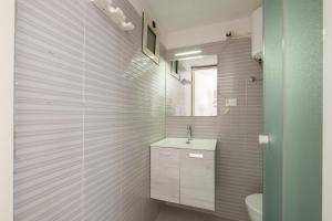 Kúpeľňa v ubytovaní Camera in Villa, 1 minuto da Porto Pino