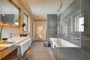 Koupelna v ubytování HUBER's Boutiquehotel