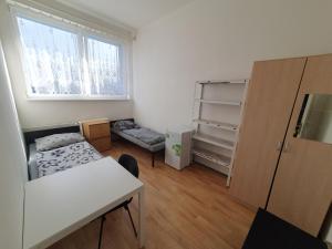 Postel nebo postele na pokoji v ubytování Ubytovna Vídeňská