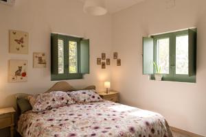 Tempat tidur dalam kamar di Casina al Castello