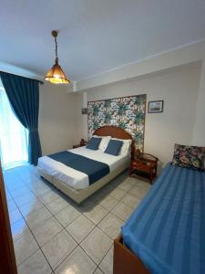Cama o camas de una habitación en Casa Famiani Bed & Breakfast
