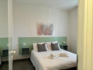 Ένα ή περισσότερα κρεβάτια σε δωμάτιο στο Villa Giorgio 2 [Mare e Pineta] +19 φωτογραφίες