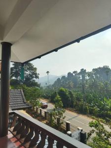 A balcony or terrace at Nostaligia Homestay,wayanad