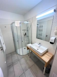 Koupelna v ubytování Aqua Hotel