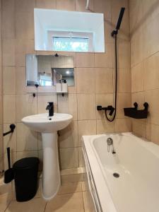 Ванная комната в Family/group Apartment +17 фотографий