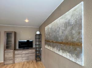 Телевизор и/или развлекательный центр в Family/group Apartment