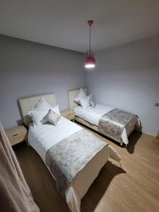 Кровать или кровати в номере Luxurious appartement in Marrakech with Pool&Golf PRESTIGIA AMBRE