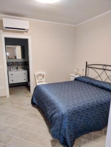 Agriturismo Maremma Amara客房内的一张或多张床位
