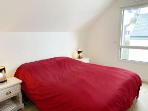 En eller flere senge i et værelse på KERSALINE - Maison neuve, Bourg et plage - K111