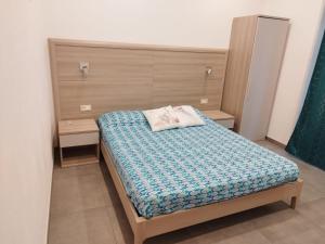 Postel nebo postele na pokoji v ubytování Mare dentro rooms