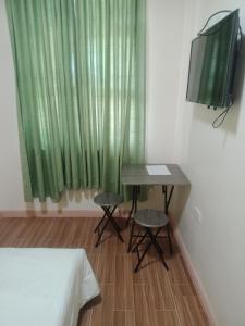 Imagem da galeria de bucana traveler's inn em Guinisiliban mais 22 fotografias