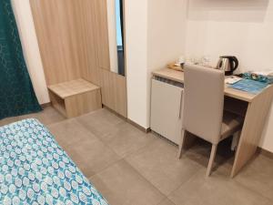 Kuchyň nebo kuchyňský kout v ubytování Mare dentro rooms