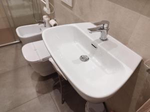 Koupelna v ubytování Mare dentro rooms