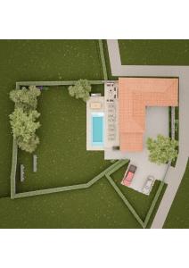 an overhead view of a house with a pool at Reverence Villas Caldelas in Antas de Ulla