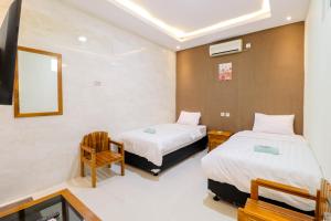 Katil atau katil-katil dalam bilik di Hotel Safara Yogyakarta