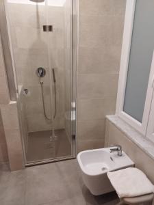 Koupelna v ubytování Mare dentro rooms