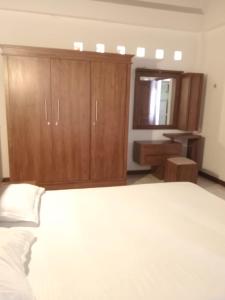 Cama o camas de una habitación en Jayawardana House