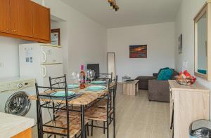 A kitchen or kitchenette at Basiliki's Apartments